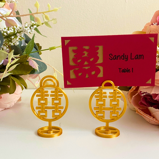 Gold 3D printed place card holders with double happiness symbol