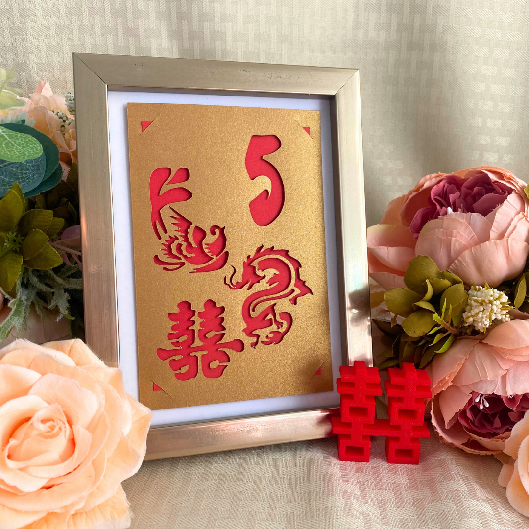 Gold cardstock table number with double happiness symbol, phoenix, and dragon