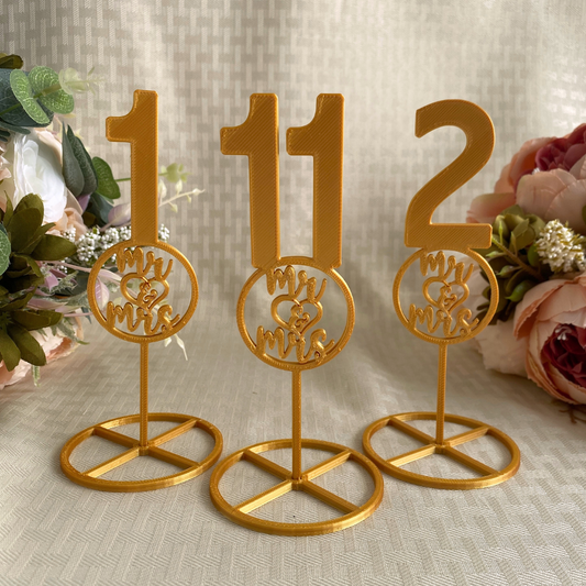 3D printed gold table numbers with Mr & Mrs Sign